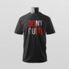 Ein schwarzes T-Shirt mit der Aufschrift „Don’t quit!“ wird frontal präsentiert – Sinnstoff.